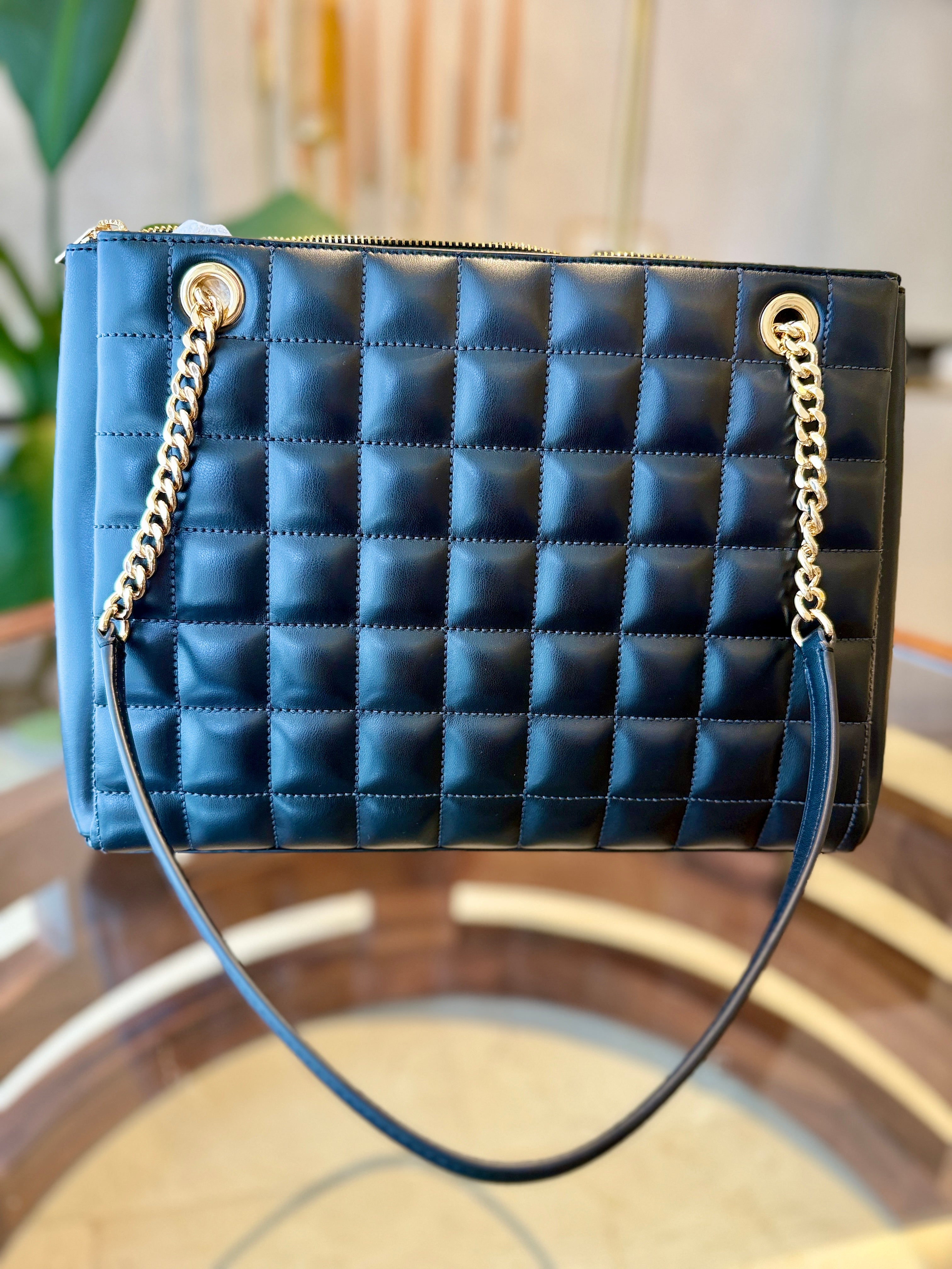 Bolsa negra acolchada Michael Kors