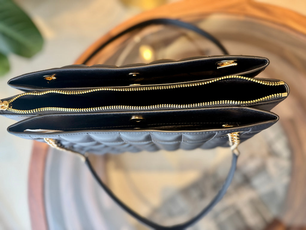 Bolsa negra acolchada Michael Kors